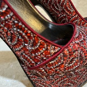 Red heels Carlos Santana 6.5